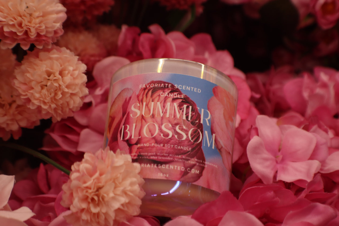 Summer blossom candle with the scent and fragrance of Cherry blossom in the background of pink flowers